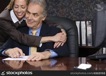 Woman hugging her boss