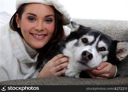 Woman hugging her dog
