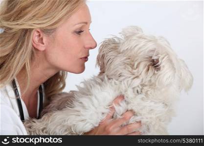 Woman hugging her dog