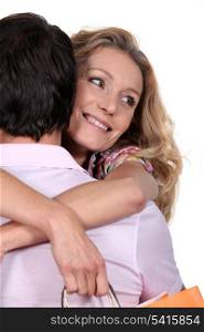 Woman hugging her husband
