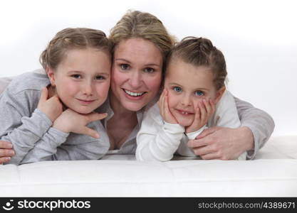 Woman hugging her kids