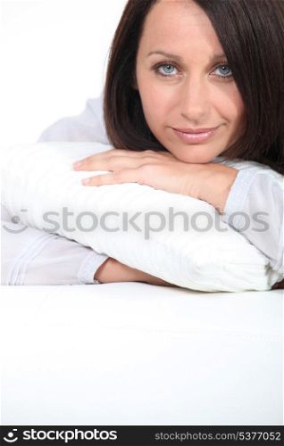 Woman hugging her pillow