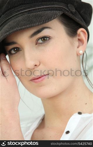 Woman in a baker-boy cap