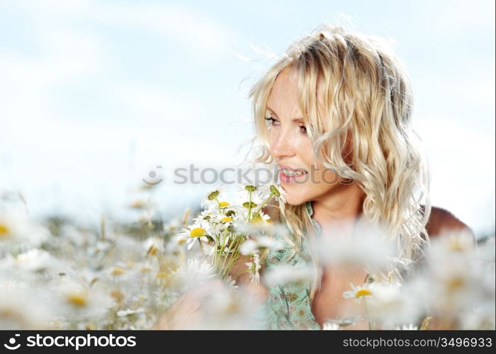 Woman in a field of flowers