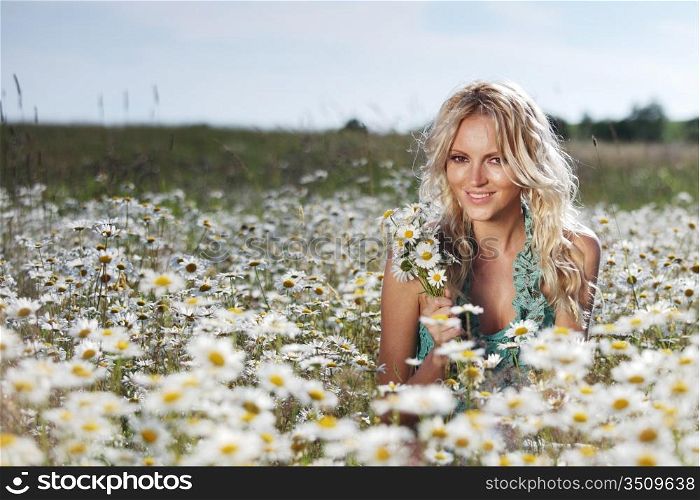 Woman in a field of flowers
