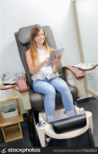 woman in a foot spa