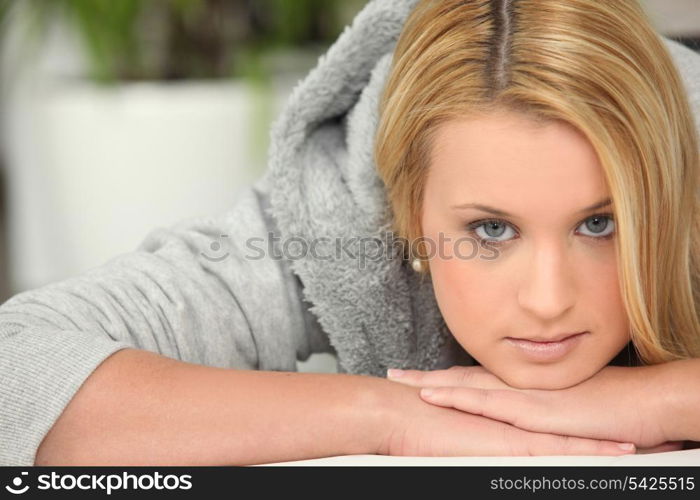 Woman in a grey sweatshirt