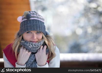 Woman in a hat and scarf