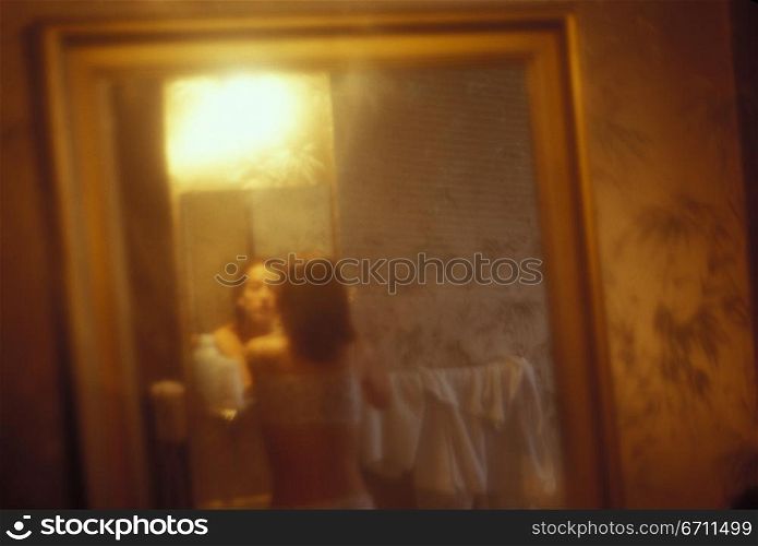 Woman in a mirror