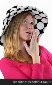 Woman in a polka dot floppy hat