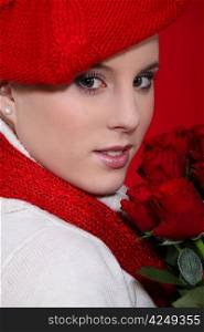 Woman in a red beret with red roses