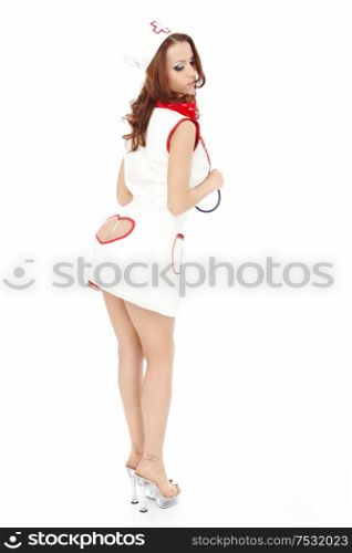 Woman in a sexual suit of the nurse, isolated
