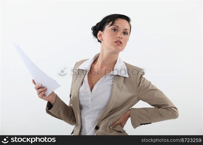 woman in a suit holding documents