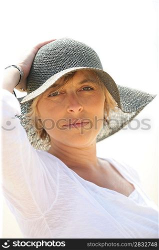 Woman in a summer hat