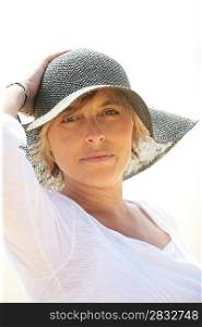 Woman in a summer hat