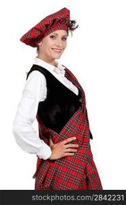 Woman in a traditional tartan outfit