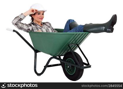 Woman in a wheelbarrow