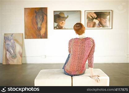 Woman in art gallery