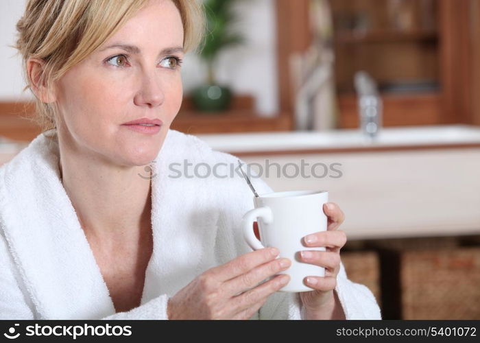 Woman in bathrobe