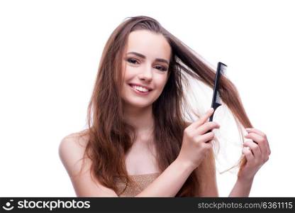 Woman in beauty concept combing hair