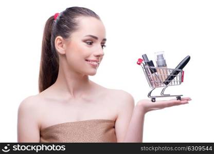 Woman in beauty concept with make up holding shopping cart