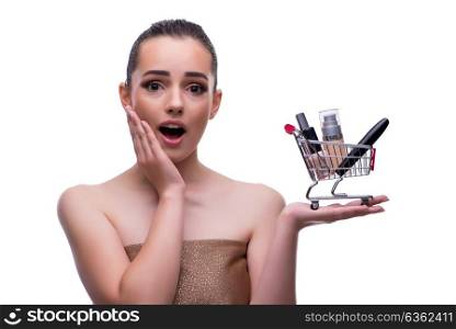 Woman in beauty concept with make up holding shopping cart