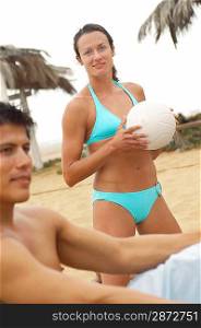 Woman in Bikini Holding Volleyball