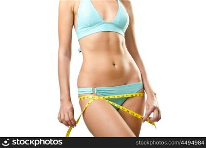 Woman in bikini in diet concept isolated on white
