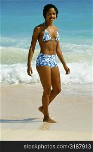 Woman in bikini, Natural Arches Beach, Bermuda