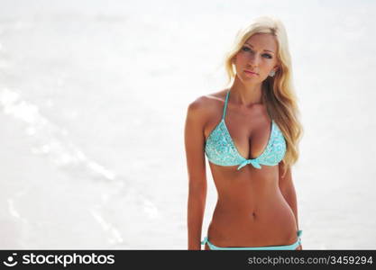 woman in bikini on sea beach