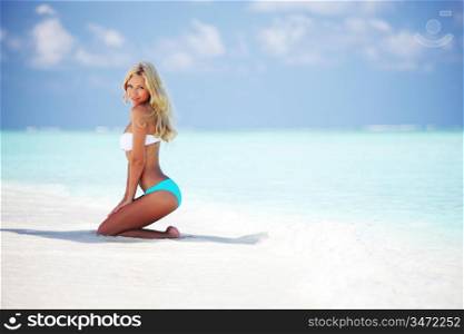 woman in bikini on sea beach