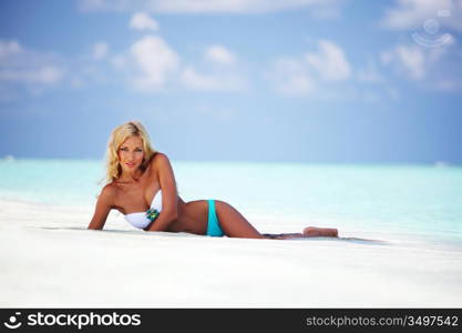 woman in bikini on sea beach