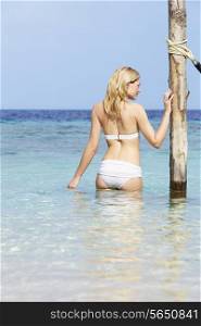 Woman In Bikini Standing In Beautiful Tropical Sea