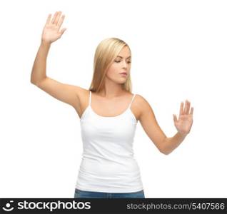 woman in blank white t-shirt with raised hands