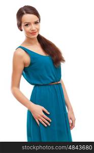 Woman in blue dress. Beautiful young brunette woman in blue dress