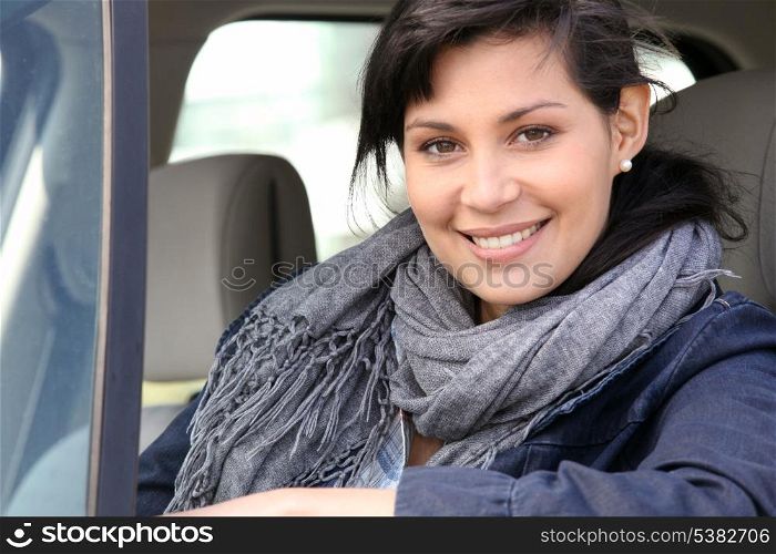 Woman in car with window open