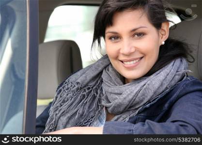 Woman in car with window open
