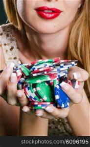 Woman in casino playing cards