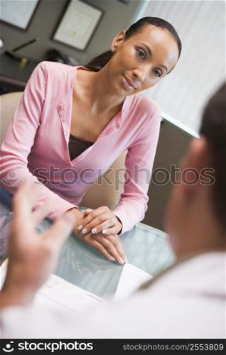 Woman in consultation at IVF clinic (selective focus)