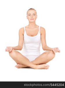 woman in cotton undrewear practicing yoga lotus pose