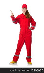 Woman in coveralls pressing virtual button