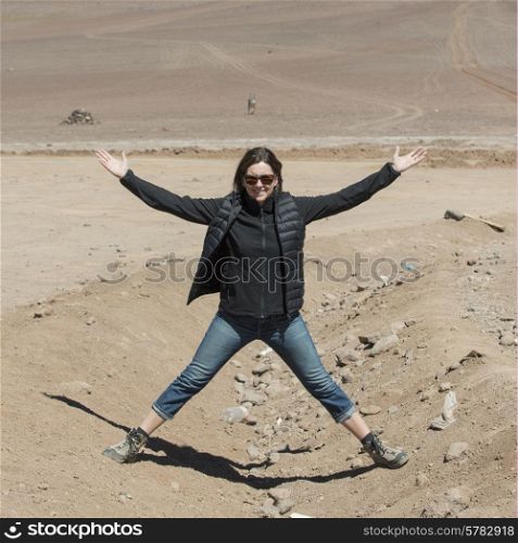 Woman in desert, Los Flamencos National Reserve, San Pedro de Atacama, El Loa Province, Antofagasta Region, Chile-Bolivia Border