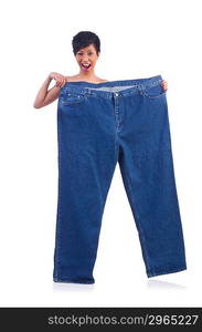 Woman in dieting concept with big jeans