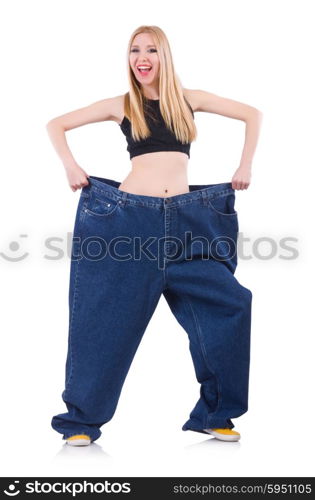 Woman in dieting concept with big jeans