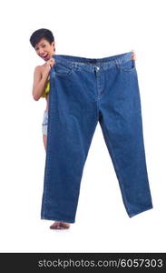 Woman in dieting concept with big jeans