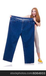 Woman in dieting concept with big jeans