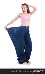 Woman in dieting concept with big jeans