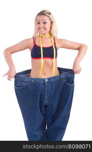 Woman in dieting concept with big jeans