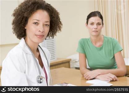Woman in doctor&acute;s office frowning