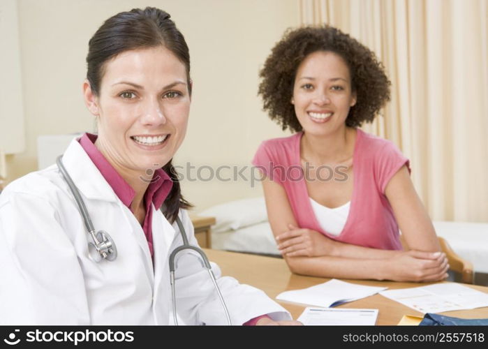 Woman in doctor&acute;s office smiling